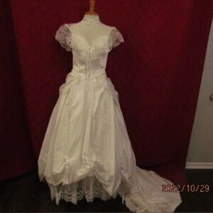 Vintage Victorian white wedding dress cap lace sleeve, short train, bustle.